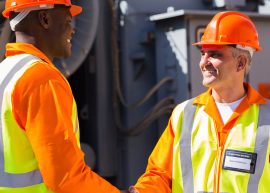 Friendly,Power,Company,Co-workers,Hand,Shaking,In,Electrical,Substation